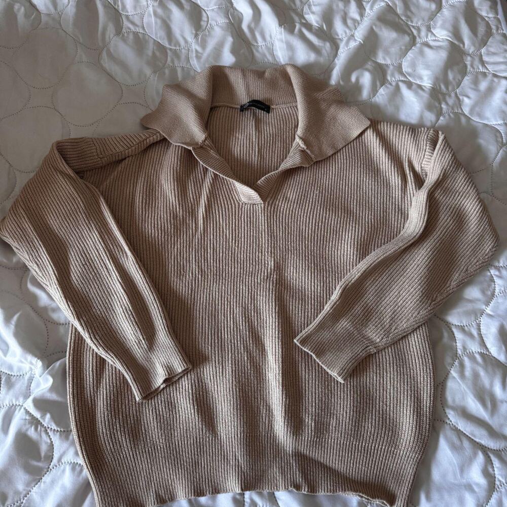 Neutral beige ribbed sweater from
